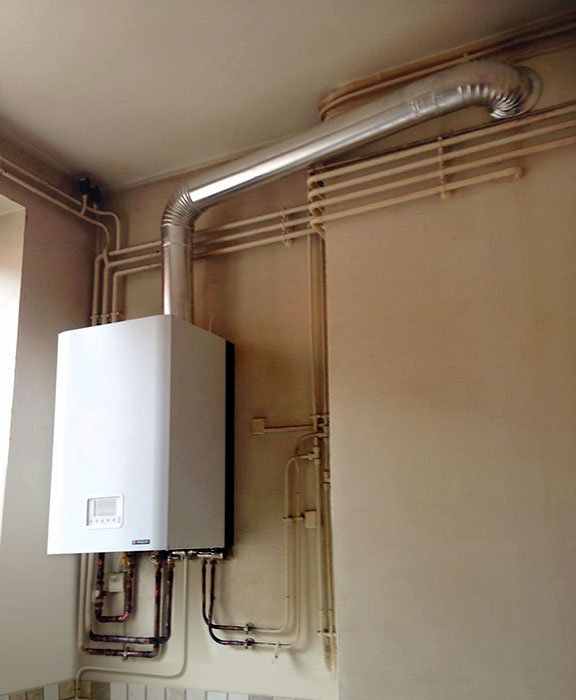 Remplacement et installation chaudière gaz dans appartement locatif lyon